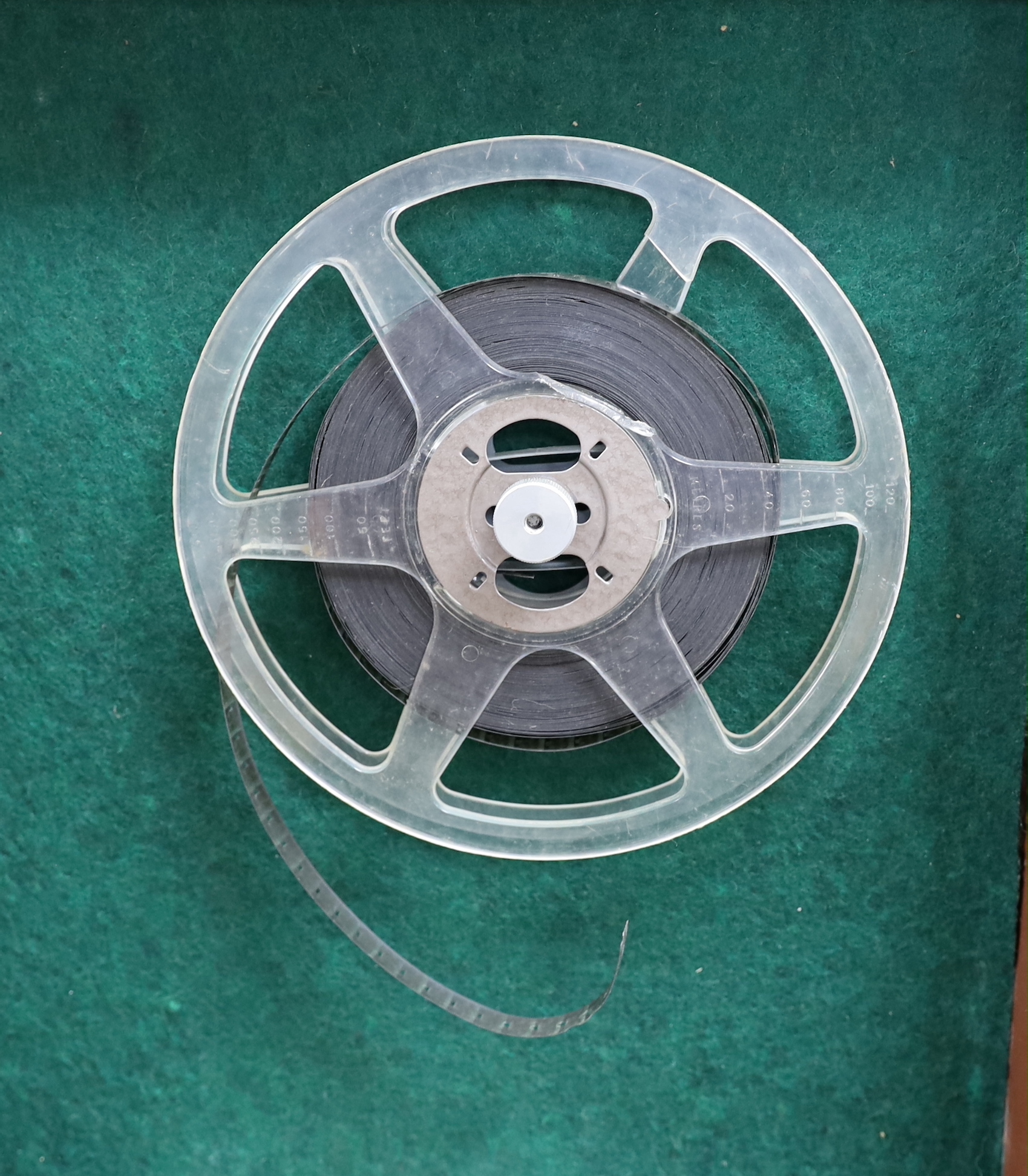 A Specto 9.5mm cine film projector in a leather case, case 32cm x 38cm x 18cm